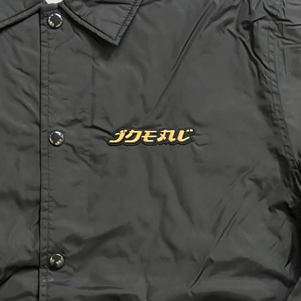Ideal JPN Gold Logo coach jacket close