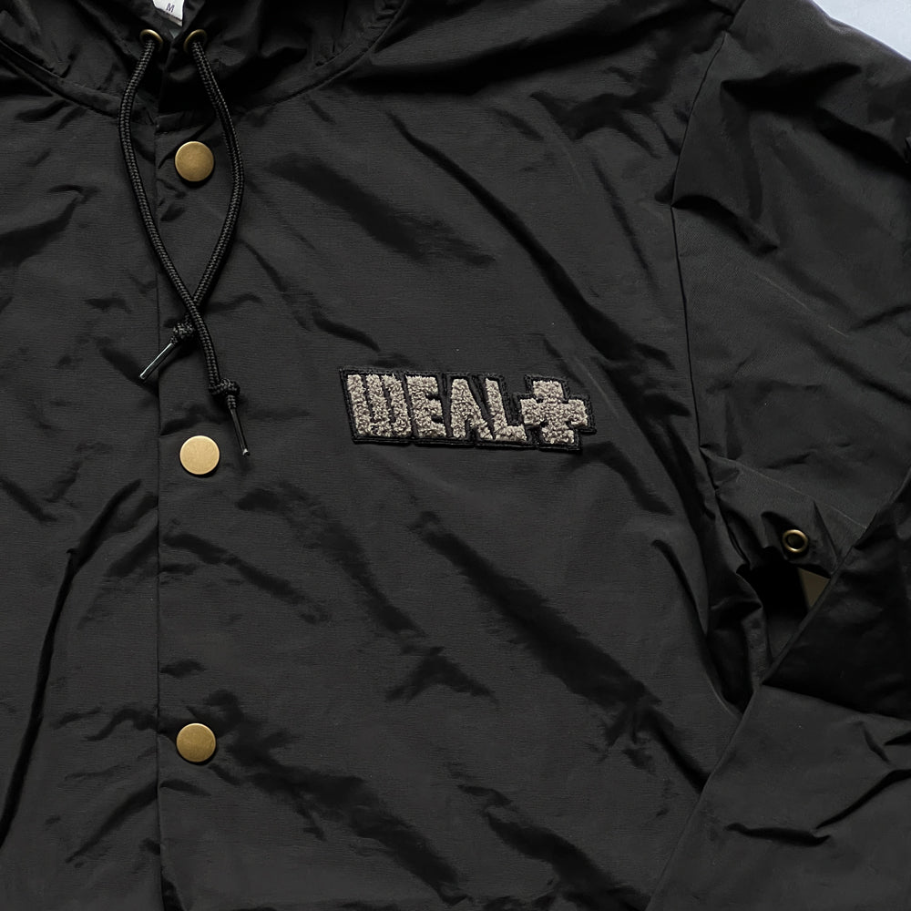 Ideal 0121 Stencil hooded coach jacket black front detail